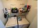 Functional laundry room with washer, dryer, and storage shelves at , Las Vegas, NV 89106