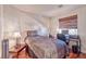 Serene bedroom featuring a bed, desk, and ample natural light for a relaxing atmosphere at 101 Morning Dr, Henderson, NV 89012