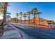 Community entrance featuring palm trees and beautiful signage for 'Sonoma' at 101 Morning Dr, Henderson, NV 89012