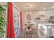 Inviting dining area with chandelier, table, and view of the backyard at 101 Morning Dr, Henderson, NV 89012