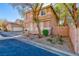 Beautiful stucco house featuring desert landscaping, a well-maintained exterior, and a paved driveway at 101 Morning Dr, Henderson, NV 89012