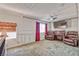 Comfortable living room features a fireplace, large screen tv and cozy brown leather chairs at 101 Morning Dr, Henderson, NV 89012