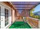 Cozy covered patio with outdoor seating and lattice railing offers a relaxing outdoor space at 101 Morning Dr, Henderson, NV 89012