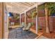 Comfortable outdoor patio with seating, shaded covering, and lush plants for enjoying a relaxing day at 101 Morning Dr, Henderson, NV 89012