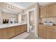 Bathroom with double sinks, vanity, and a printer at 10457 Raining Sky St, Las Vegas, NV 89178