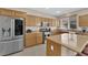 Kitchen with a granite countertop island, stainless steel appliances, and recessed lighting at 10457 Raining Sky St, Las Vegas, NV 89178