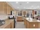 Kitchen with stainless steel appliances, gas cooktop, and granite countertops at 10457 Raining Sky St, Las Vegas, NV 89178