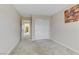 Neutral bedroom featuring plush carpeting, a double closet, and a Zebra art piece, creating a simple atmosphere at 1053 Hickory Park St, Las Vegas, NV 89138