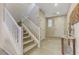 Wide view of entryway featuring staircase, neutral decor, and tile floor at 1053 Hickory Park St, Las Vegas, NV 89138