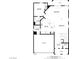 A clear layout of the first floor reveals open concept kitchen, dining, living and garage access at 1053 Hickory Park St, Las Vegas, NV 89138