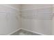 Walk-in closet with ample shelving and carpeting at 1053 Hickory Park St, Las Vegas, NV 89138