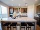 Modern kitchen with a large island, stainless steel appliances, and ample counter space at 1122 Brilliant Meadow Ave, North Las Vegas, NV 89086