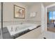 Bathroom including a soaking tub to enjoy relaxing views at 125 E Harmon Ave # 3220, Las Vegas, NV 89109