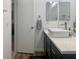 Bathroom featuring a quartz countertop, rectangle sink, with a view of a door at 1463 Evening Song Ave, Henderson, NV 89012