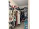 Walk-in closet offering ample storage space for clothing and accessories at 1463 Evening Song Ave, Henderson, NV 89012