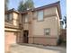 Two-story home with a desert-toned exterior and a well-maintained front yard showcasing curb appeal at 1463 Evening Song Ave, Henderson, NV 89012