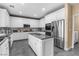 Bright kitchen with stainless steel appliances and a granite-topped island at 1495 Le Luberon Ct, Las Vegas, NV 89123