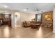 Comfortable living room with a ceiling fan and access to the Primary suite and en suite bathroom at 1495 Le Luberon Ct, Las Vegas, NV 89123
