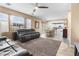 Bright living area with open floor plan to kitchen and dining areas at 1495 Le Luberon Ct, Las Vegas, NV 89123