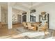 Bright dining room featuring modern lighting, a dining table with seating, and stylish decor at 19 Isleworth Dr, Henderson, NV 89052