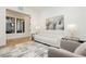 Bright living room featuring a comfortable white sofa, neutral art and modern furnishings at 19 Isleworth Dr, Henderson, NV 89052