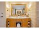 This bathroom offers an intricately framed mirror, designer fixtures and a storage vanity at 2000 Fashion Show Dr # 3526, Las Vegas, NV 89109