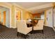 Cozy dining area featuring a round table, comfortable chairs, and an adjacent kitchenette at 2000 Fashion Show Dr # 3526, Las Vegas, NV 89109