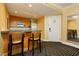 Convenient kitchenette with bar seating, modern appliances, and ample storage; ideal for quick meals at 2000 Fashion Show Dr # 3526, Las Vegas, NV 89109
