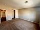Spacious bedroom features neutral walls, carpet flooring, and a closet at 2105 William Holden Ct, Las Vegas, NV 89142