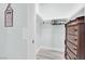 Bright closet area with organized shelving and a dresser with drawers for ample storage at 2615 W Gary Ave # 1028, Las Vegas, NV 89123