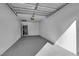 Spacious garage interior with painted floor, ready for parking or storage at 2615 W Gary Ave # 1028, Las Vegas, NV 89123