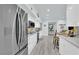 Spacious kitchen with stainless steel appliances, white cabinets, and open layout for easy entertaining at 2615 W Gary Ave # 1028, Las Vegas, NV 89123