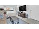 Spacious living room features modern design, a comfortable sofa, and an open layout seamlessly connected to the kitchen at 2615 W Gary Ave # 1028, Las Vegas, NV 89123