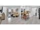 Open-concept living space seamlessly connects living, dining, and kitchen areas with modern appeal at 2615 W Gary Ave # 1028, Las Vegas, NV 89123