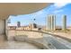 Balcony overlooking the city featuring glass railings providing an unobstructed view at 2777 Paradise Rd # 1208, Las Vegas, NV 89109