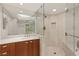 Spa like bathroom featuring modern lighting, large shower and a vanity at 2777 Paradise Rd # 1208, Las Vegas, NV 89109