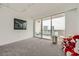 Bright bedroom with floor to ceiling windows and a walkout balcony with city views at 2857 Paradise Rd # 2704, Las Vegas, NV 89109