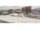 Expansive city view from above a complex and parking lot with the High Roller in the background at 2857 Paradise Rd # 2704, Las Vegas, NV 89109