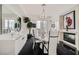 Modern dining room with elegant lighting, sleek floors, and art accents at 2857 Paradise Rd # 2704, Las Vegas, NV 89109
