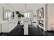 Dining room featuring a large white table, modern decor, and sleek black floors at 2857 Paradise Rd # 2704, Las Vegas, NV 89109