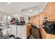 Modern kitchen featuring sleek cabinetry, breakfast bar, and city views at 2857 Paradise Rd # 2704, Las Vegas, NV 89109