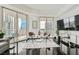 Modern living room with balcony access, comfortable seating, and city views at 2857 Paradise Rd # 2704, Las Vegas, NV 89109