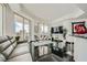 Contemporary living space with sleek furniture and access to a balcony with city views at 2857 Paradise Rd # 2704, Las Vegas, NV 89109