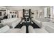 Modern living room showcasing black floors, white couches, and a sleek fireplace at 2857 Paradise Rd # 2704, Las Vegas, NV 89109