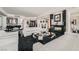 Open-concept living room with plush seating, a fireplace, and city views at 2857 Paradise Rd # 2704, Las Vegas, NV 89109