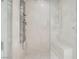 A modern shower with floor to ceiling tile and glass door at 2857 Paradise Rd # 2704, Las Vegas, NV 89109