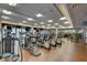 Well-equipped gym featuring cardio machines, weightlifting equipment, and hardwood flooring at 2877 Paradise Rd # 104, Las Vegas, NV 89109