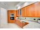 Gourmet kitchen featuring granite countertops and stainless steel appliances at 2877 Paradise Rd # 104, Las Vegas, NV 89109