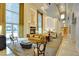 Comfortable seating arrangement with fireplace and large windows, creating a warm and inviting atmosphere at 2877 Paradise Rd # 104, Las Vegas, NV 89109