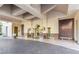 Grand lobby entrance with decorative doors, patterned floors, and elegant lighting fixtures at 2877 Paradise Rd # 104, Las Vegas, NV 89109